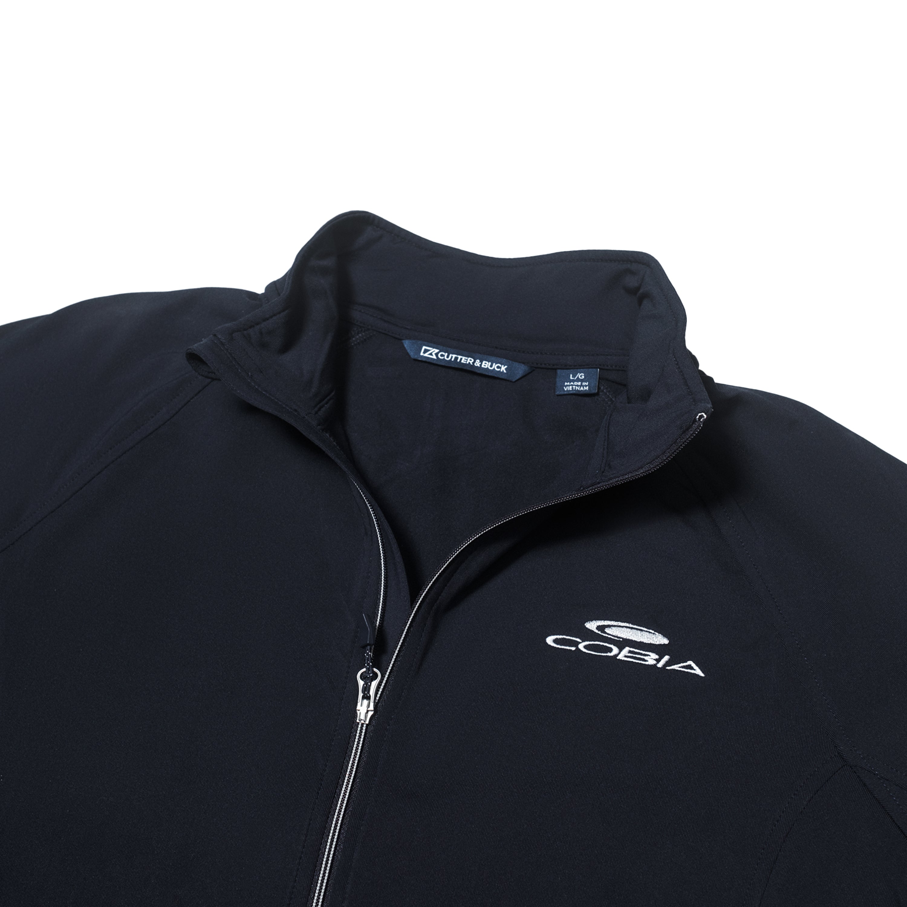 Close-up of a black quarter-zip with a cobia logo.