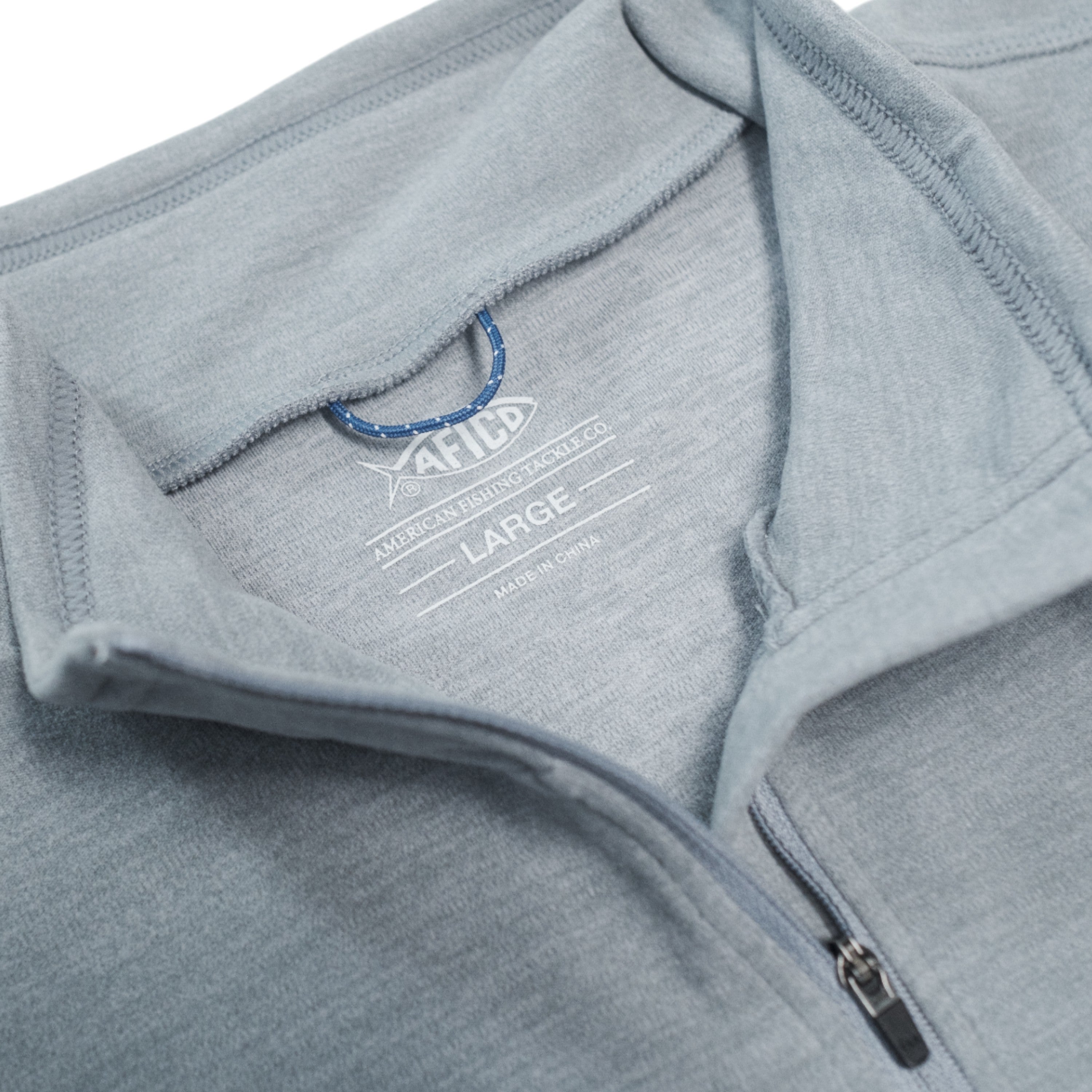 Close-up of a gray zippered sweatshirt collar with a label reading 'LARGE'.