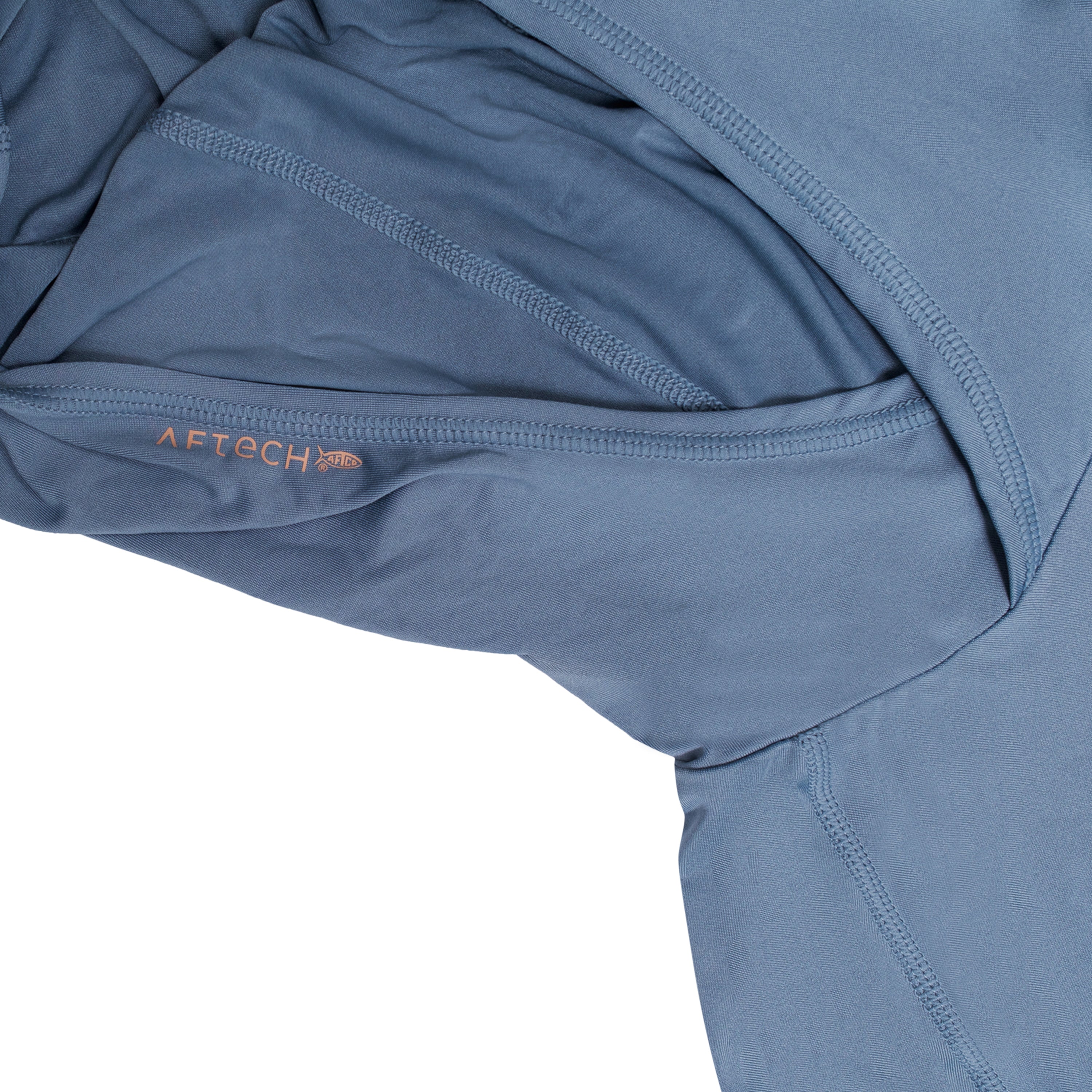 Close-up of a blue fabric hood with AFTECH branding.
