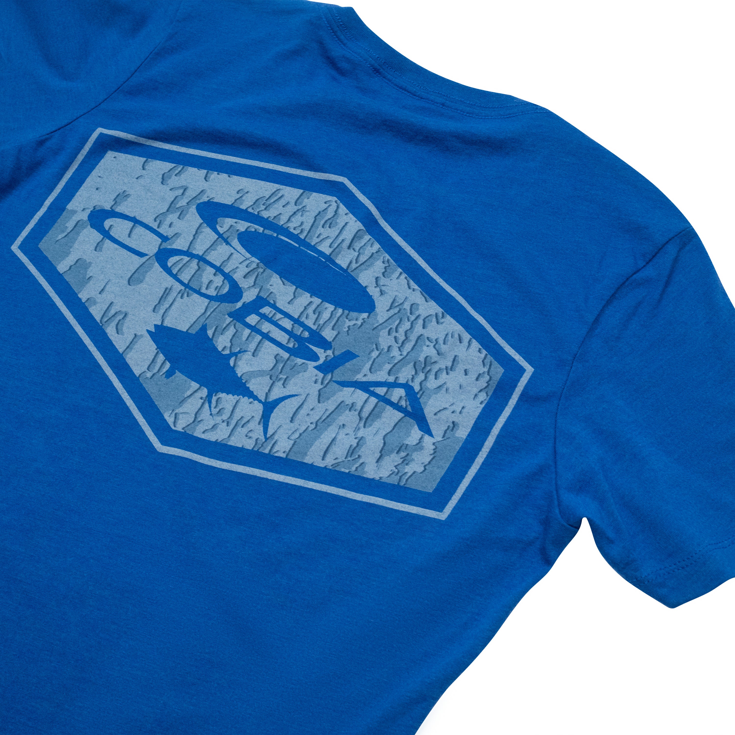 Blue T-shirt featuring a distressed design of a blue cobia logo with a fish on the back.