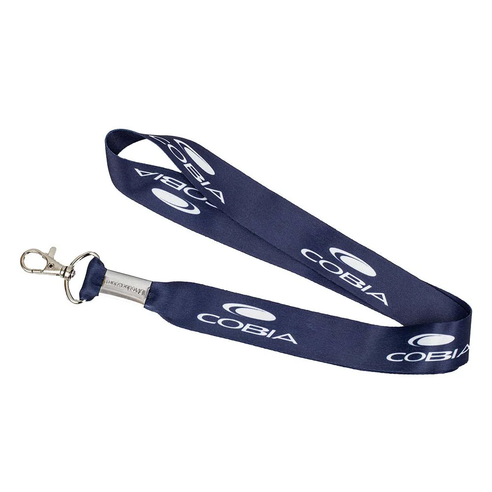 Navy blue lanyard with white Cobia logos across it and a metal clip on the end. 