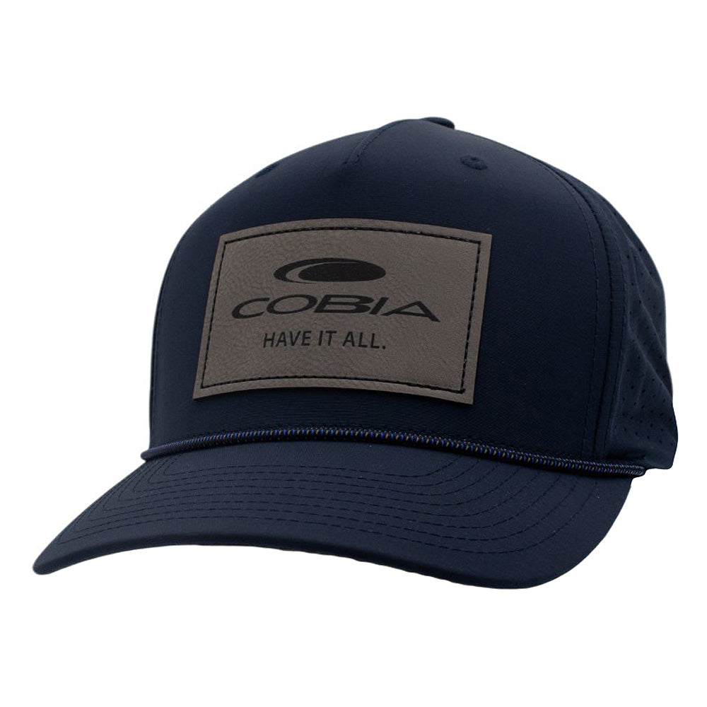 Navy blue cap with a grey patch featuring the Cobia logo on the front.