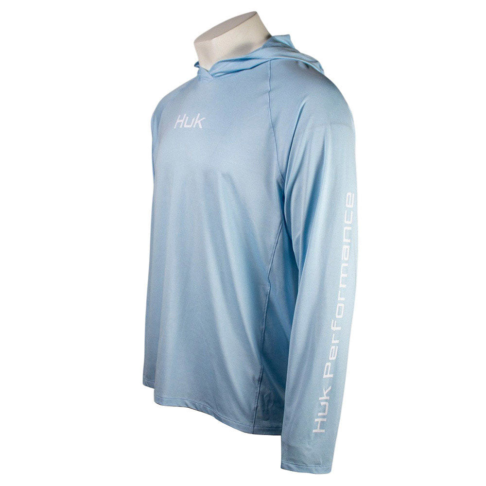 Light blue hooded long sleeve with a white huk logo down the left sleeve.