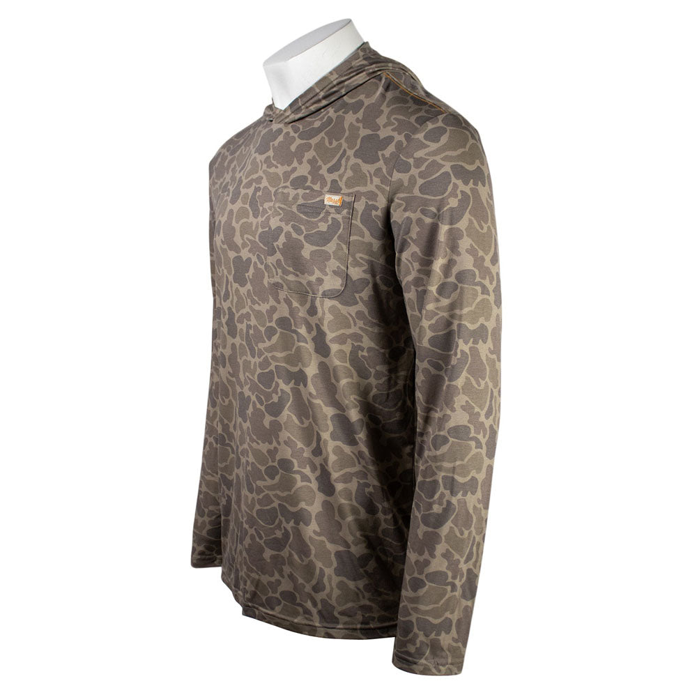 Side of a tan camouflage-patterned long-sleeve shirt.