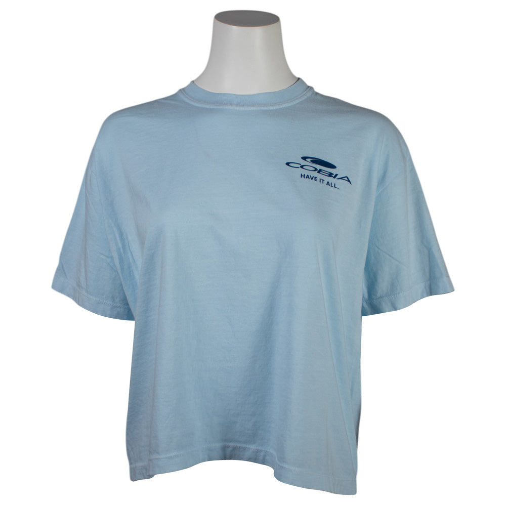 Light blue t-shirt with a dark blue cobia logo on the left chest.