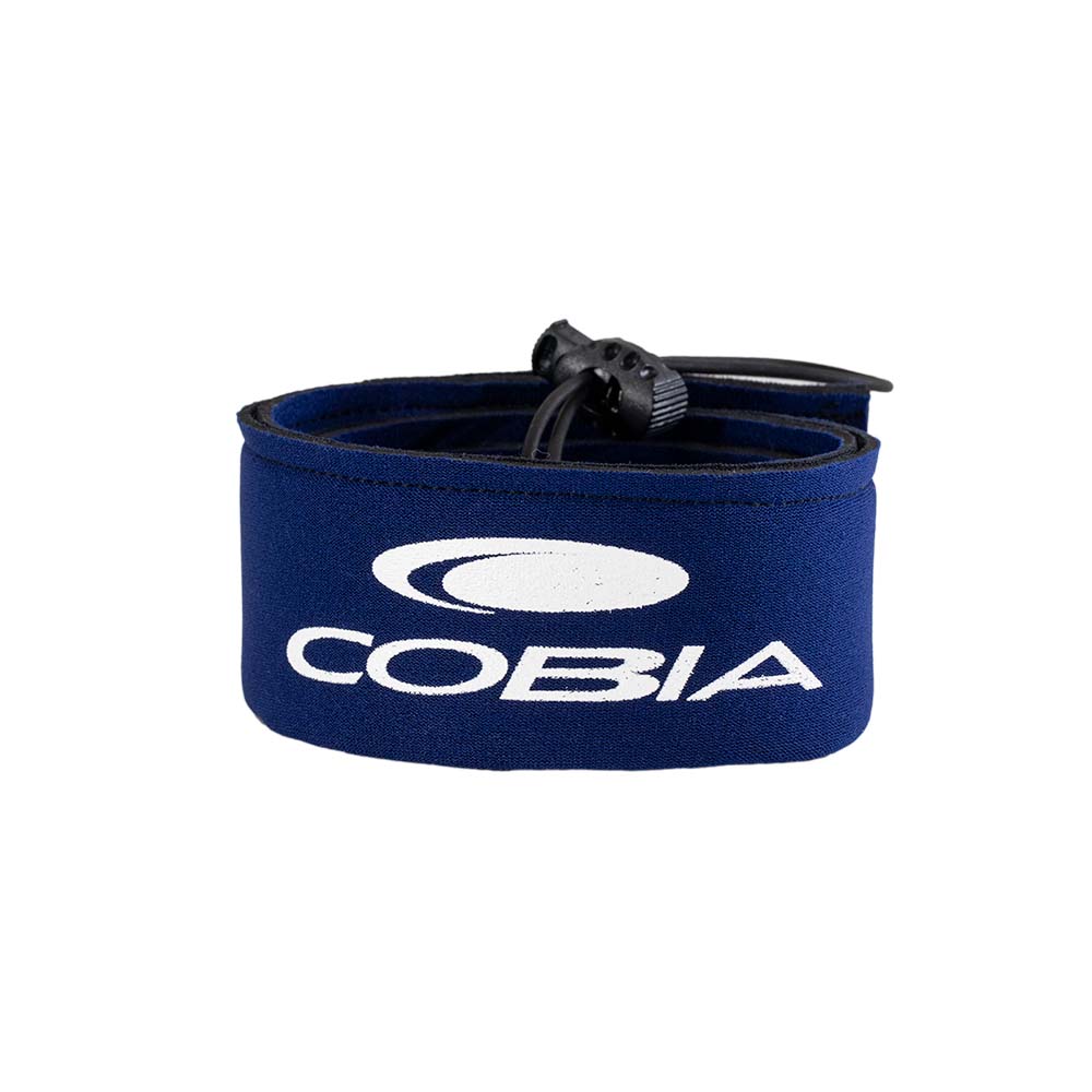 Navy blue rod sleeve with the logo 'COBIA' printed on it in white, rolled up.