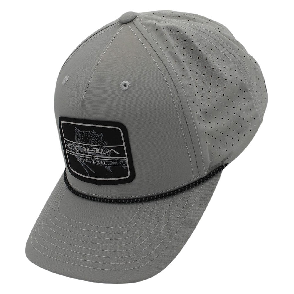 Side of a gray cap with a black patch on the front and a black rope across the bill.