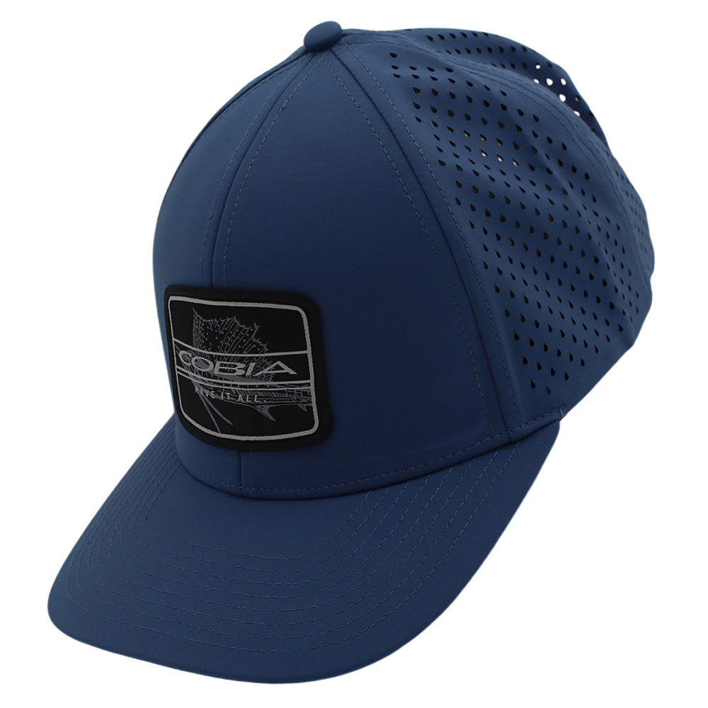 Blue cap with a brand logo patch on the front and ventilation holes on the back panels.