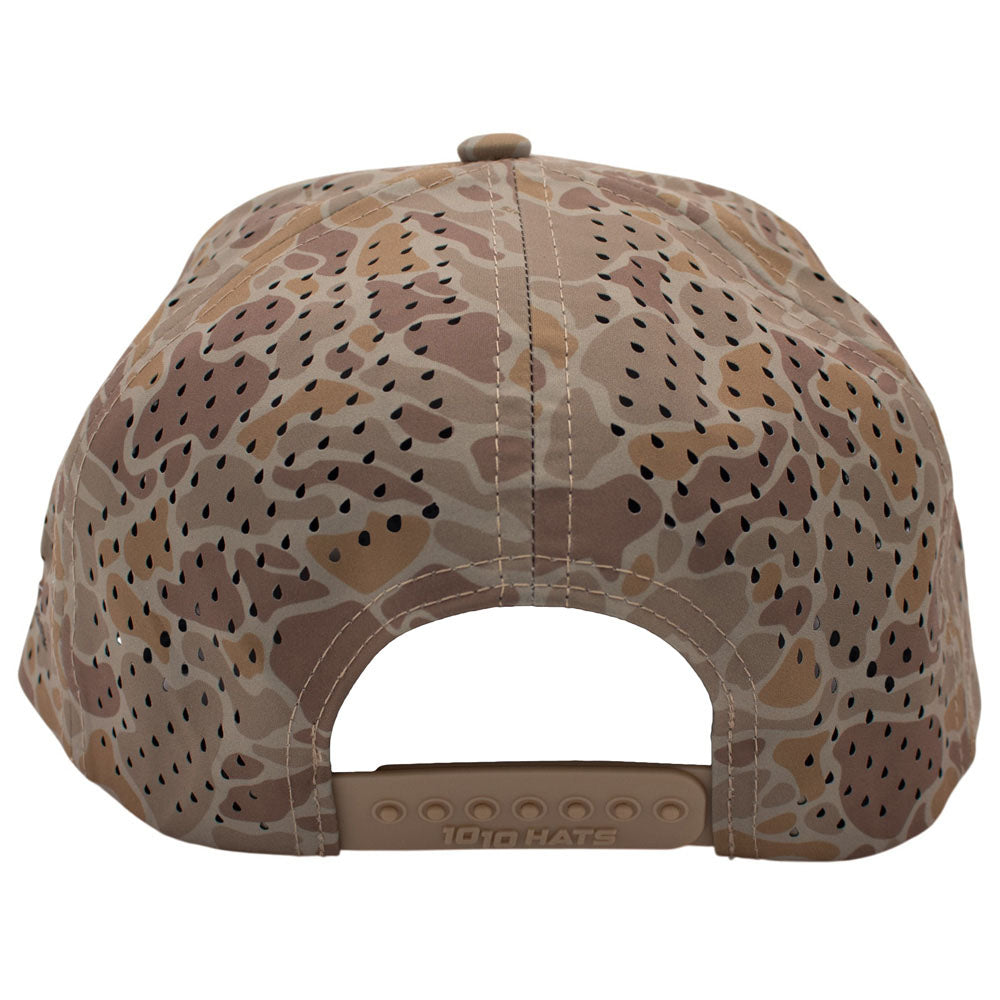 Back of a brown camouflage-patterned cap with ventilation holes and a snap back closure.