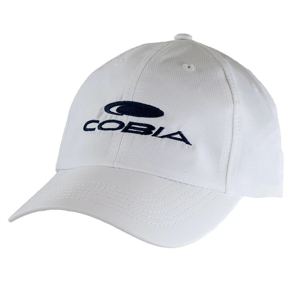 White baseball cap with a navy blue 'COBIA' logo embroidered on the front. 